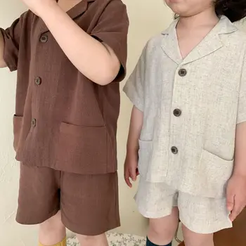 Корейская версия детской одежды 2023, летний Новый комплект из двух предметов для мальчиков и девочек, короткий рукав, однотонная Милая детская одежда для девочек